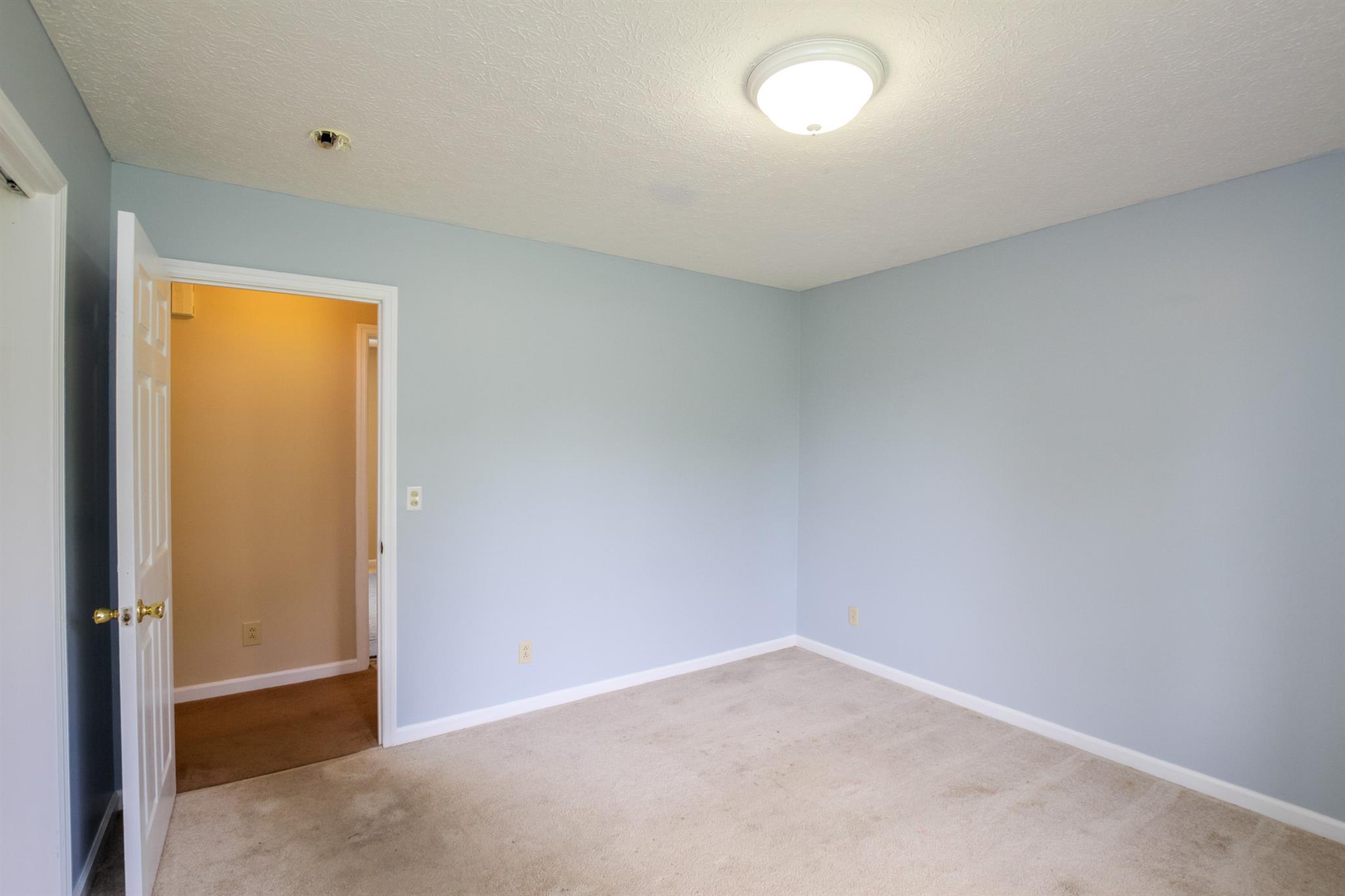 3902 Armstrong Road Springfield, TN 37172 - Photo 19 of 30 an empty room with a empty space and a window