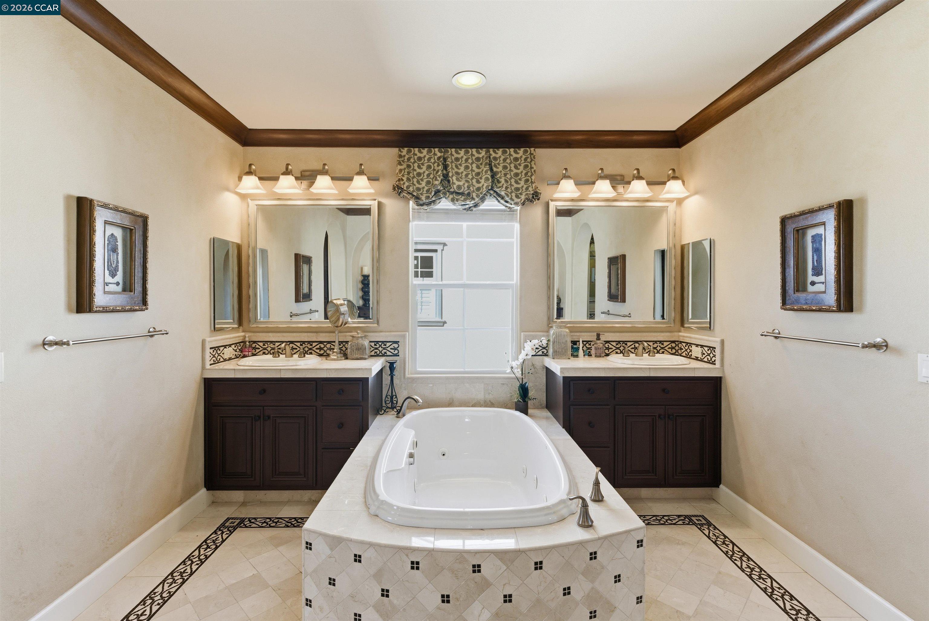 1041 South Wedgewood Road San Ramon, CA 94582 - Photo 21 of 33 a spacious bathroom with a sink and a mirror