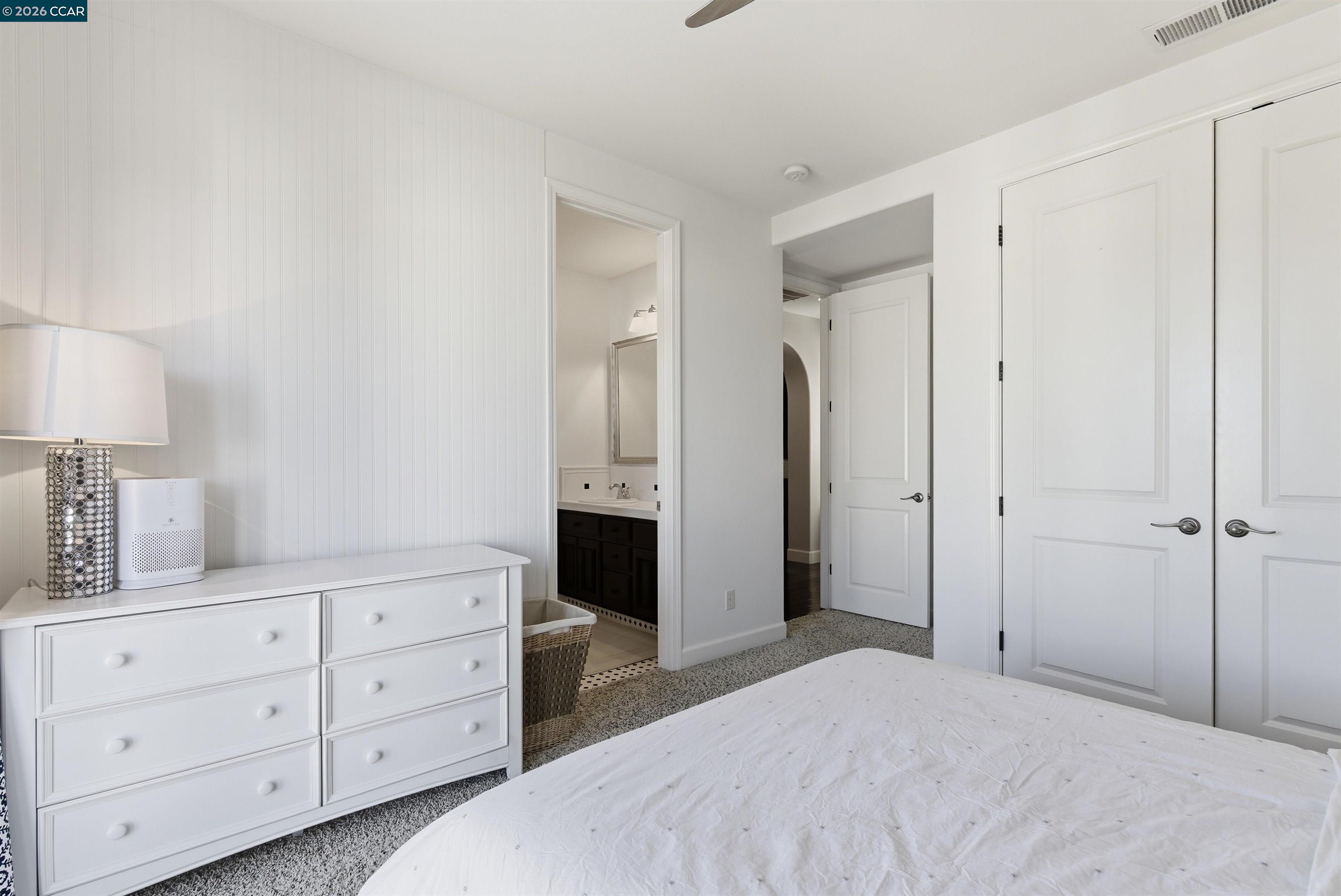 1041 South Wedgewood Road San Ramon, CA 94582 - Photo 28 of 33 a spacious bathroom with a double vanity sink and a mirror