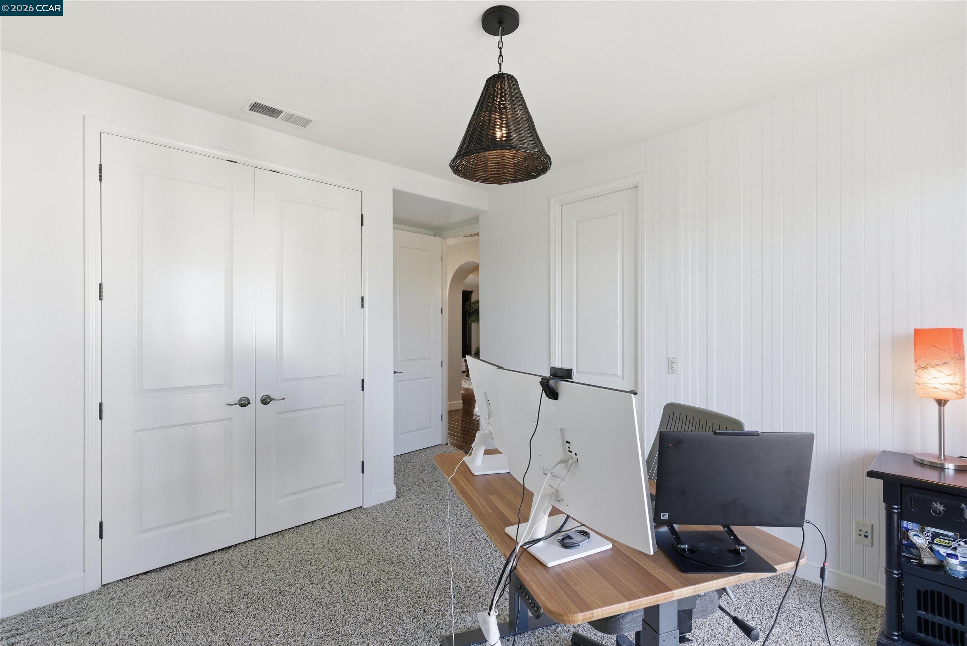 1041 South Wedgewood Road San Ramon, CA 94582 - Photo 29 of 33 a view of a workspace with furniture and a window