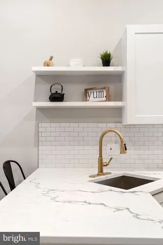 a view of a workspace with furniture