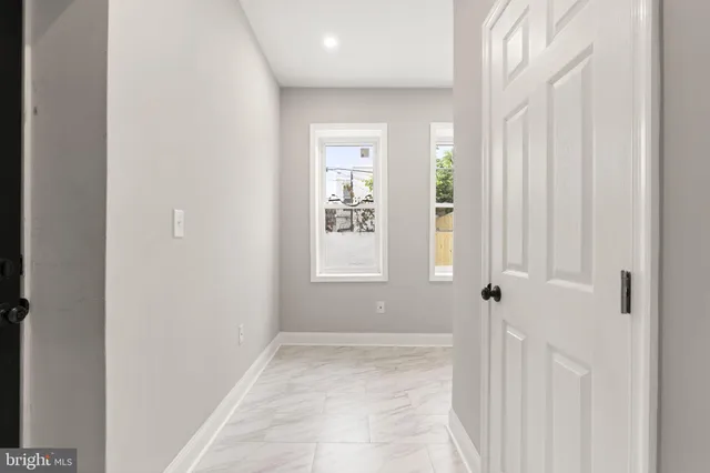 a bathroom with a sink a vanity and a mirror