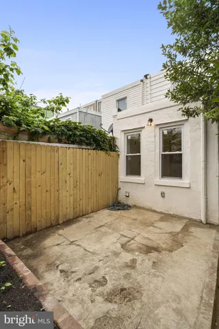 a view of a car parked in front of a building