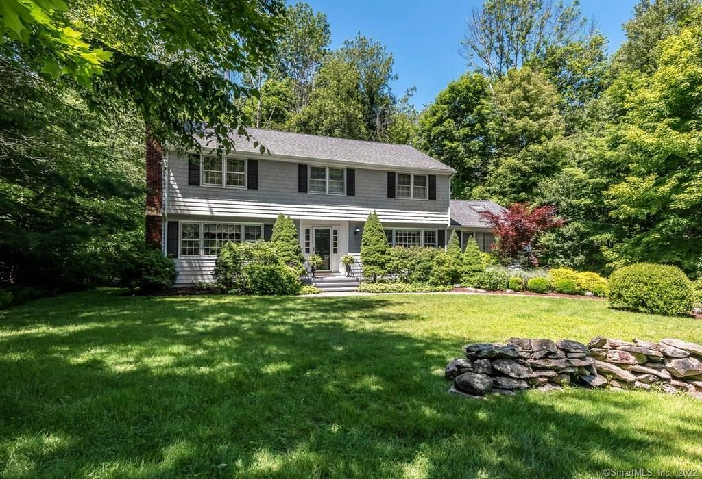 3175 Redding Road Fairfield, CT 06824 - Photo 1 of 1 a front view of a house with a garden