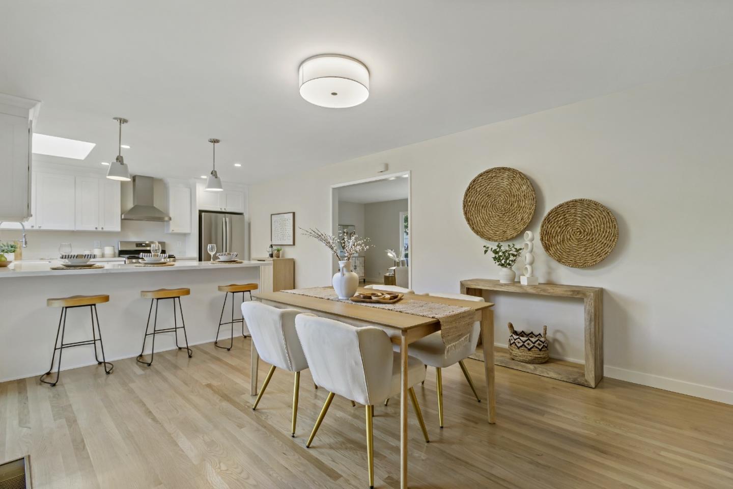 4825 Blue Ridge Drive San Jose, CA 95129 - Photo 12 of 39 a view of a dining room with furniture and wooden floor