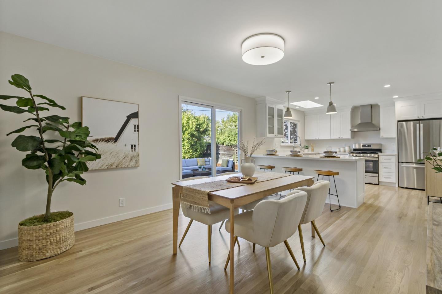 4825 Blue Ridge Drive San Jose, CA 95129 - Photo 13 of 39 a dining room with furniture and wooden floor