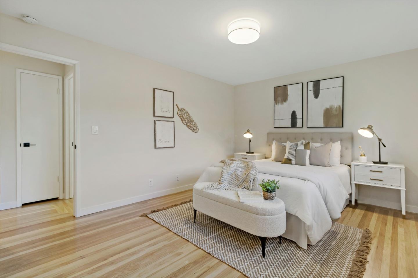 4825 Blue Ridge Drive San Jose, CA 95129 - Photo 15 of 39 a spacious bedroom with a bed and wooden floor