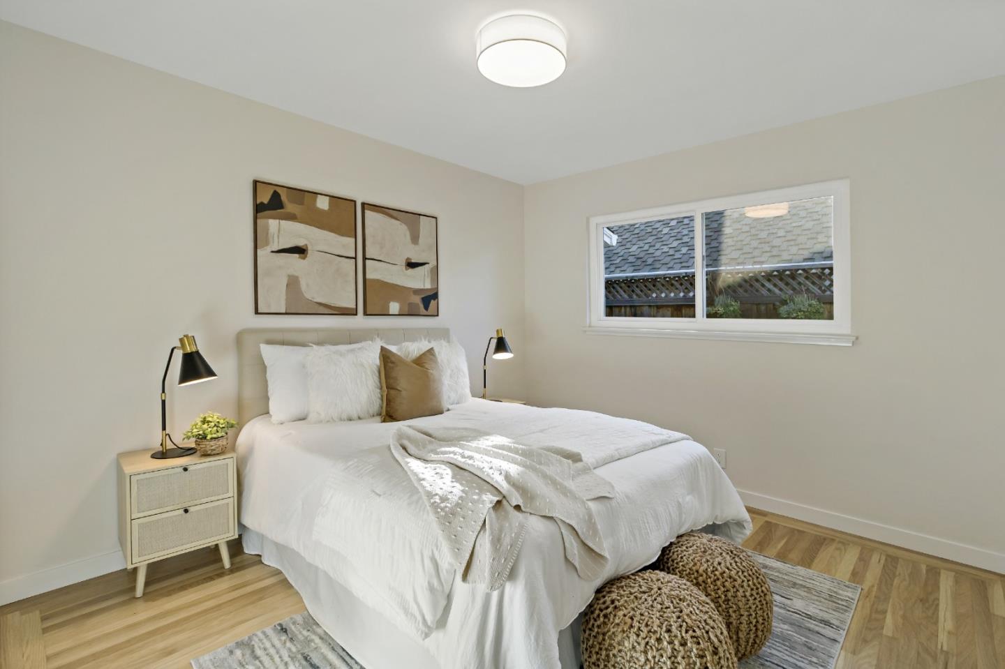 4825 Blue Ridge Drive San Jose, CA 95129 - Photo 21 of 39 a bedroom with a bed and wooden floor