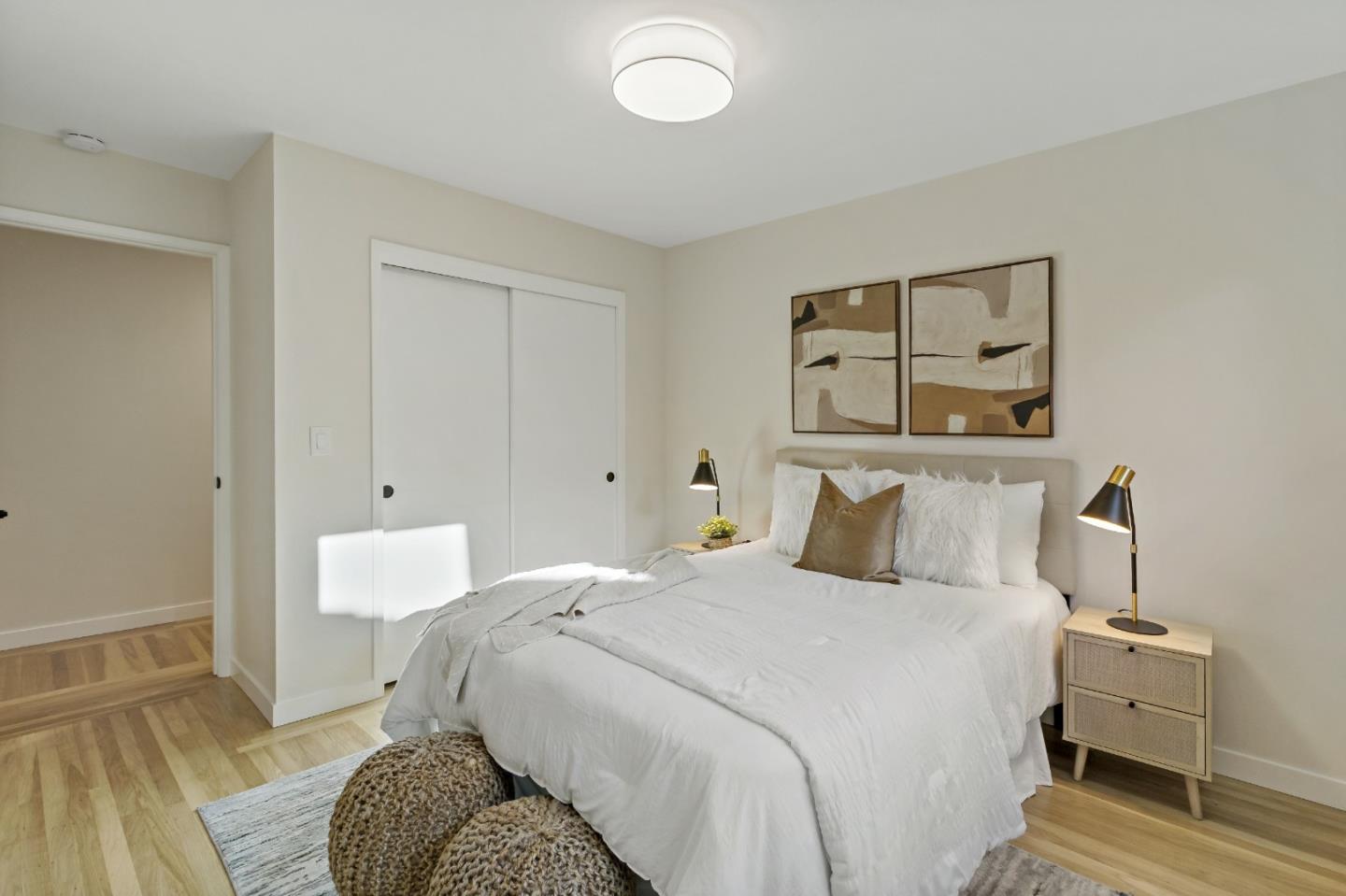 4825 Blue Ridge Drive San Jose, CA 95129 - Photo 22 of 39 a bedroom with a bed and a lamp