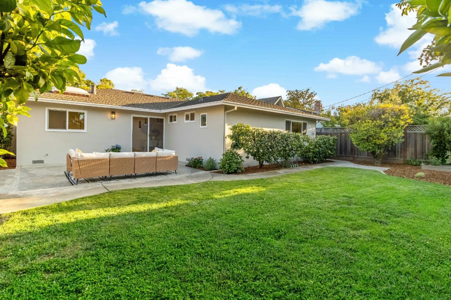 4825 Blue Ridge Drive San Jose, CA 95129 - Photo 28 of 39 a view of a house with a backyard and a patio