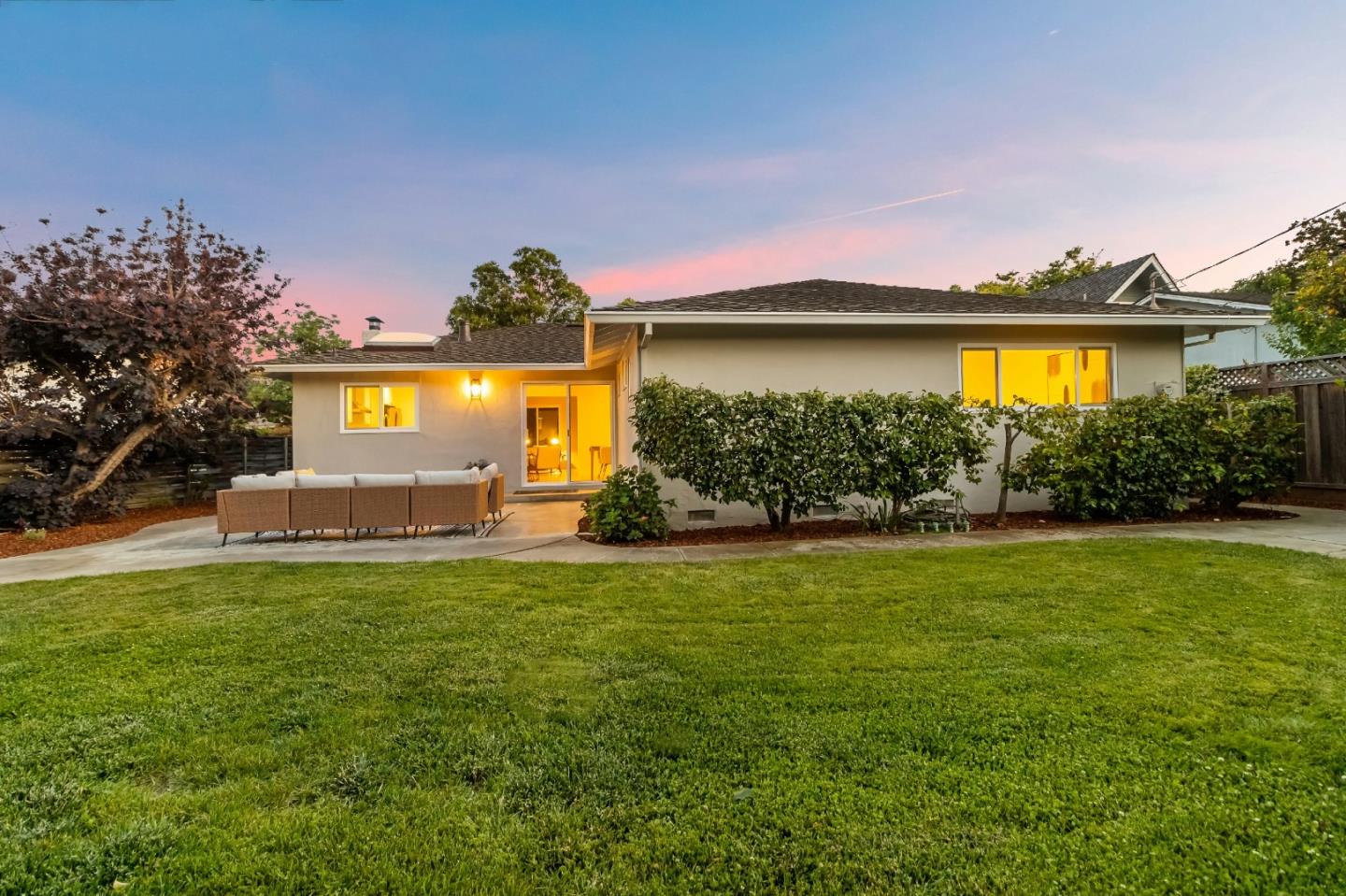 4825 Blue Ridge Drive San Jose, CA 95129 - Photo 30 of 39 a front view of a house with a garden and yard