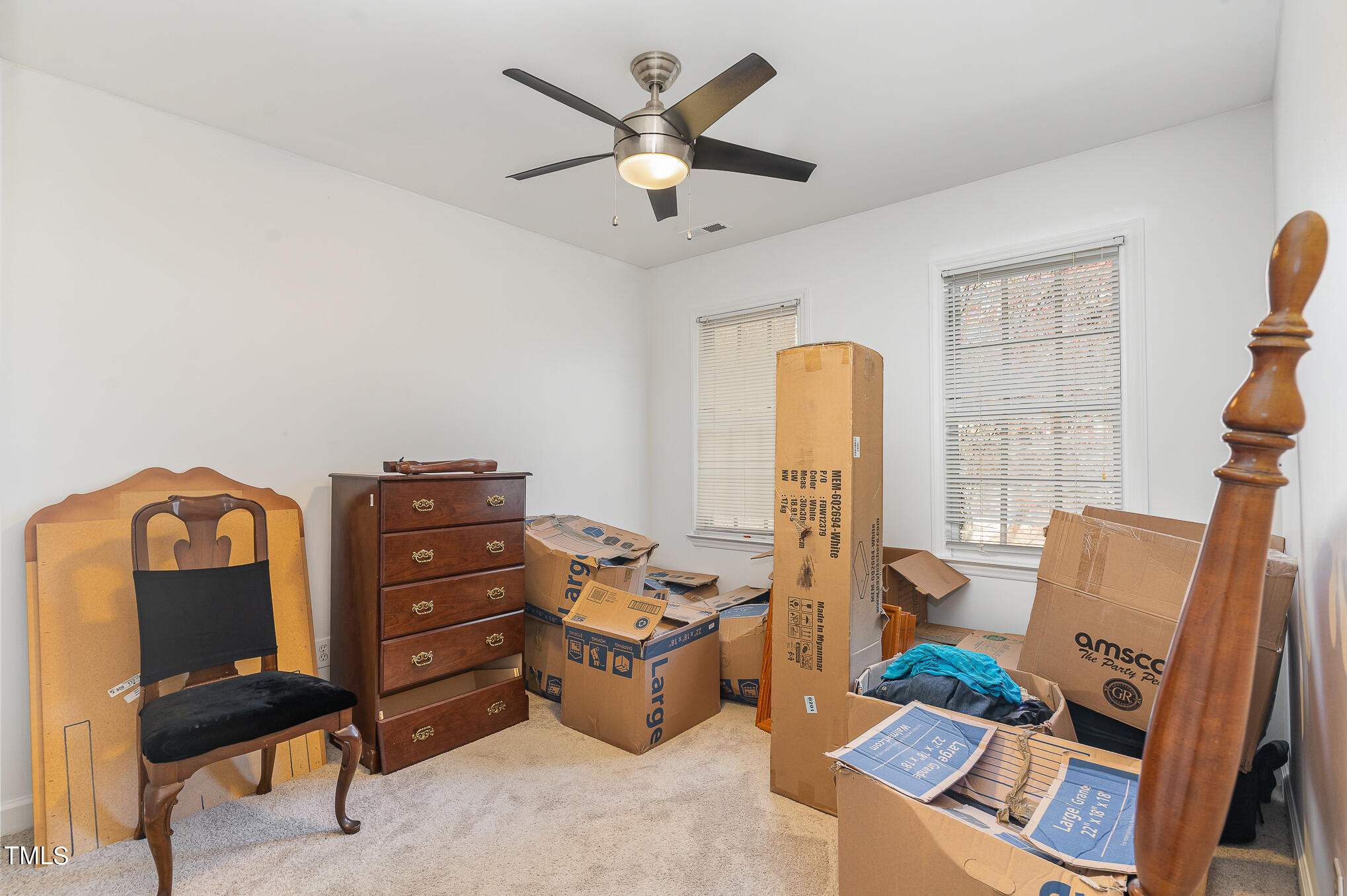 6020 Bur Trail Raleigh, NC 27616 - Photo 18 of 28 a bed room with furniture and a window