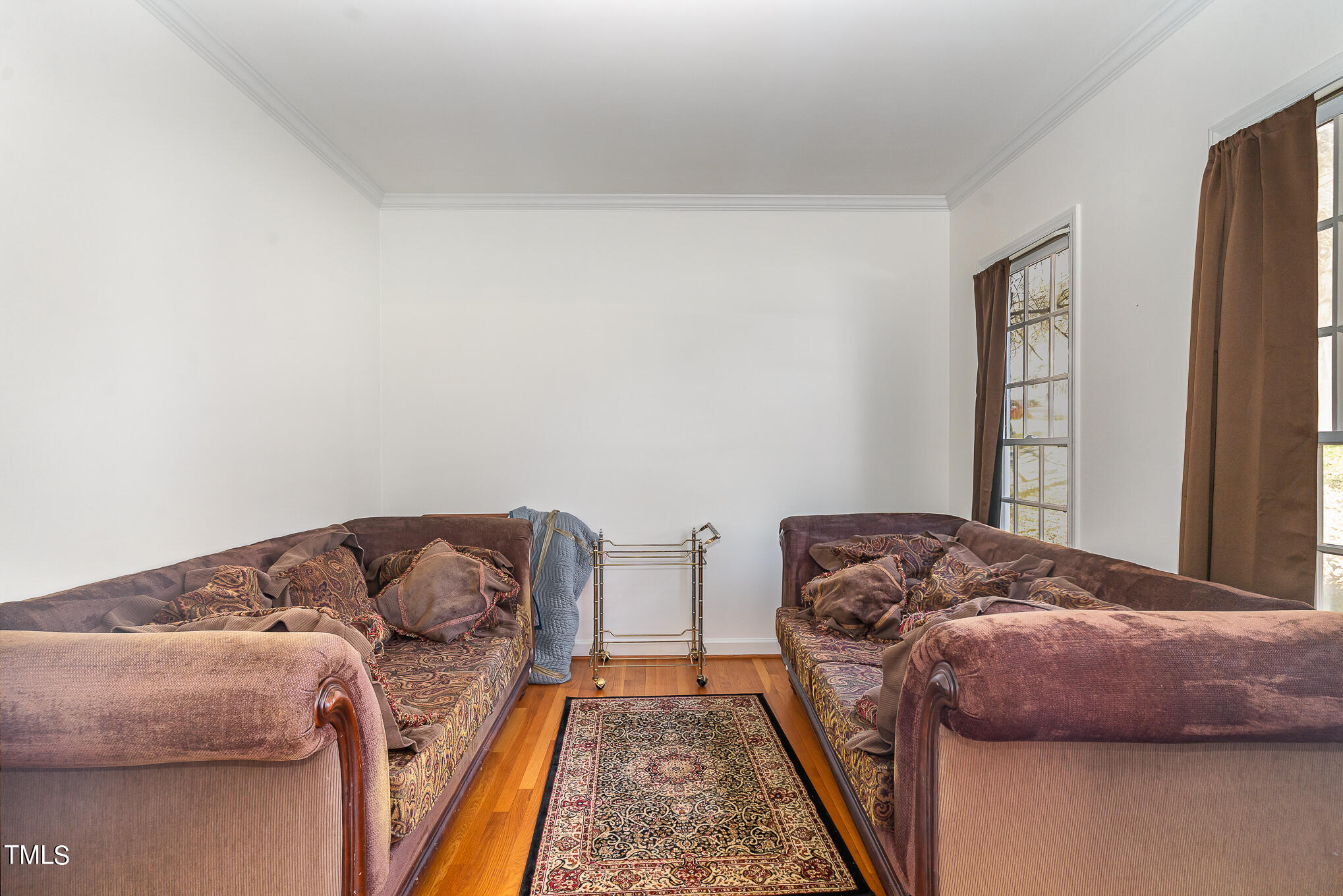 6020 Bur Trail Raleigh, NC 27616 - Photo 7 of 28 a bedroom with two bed and a window