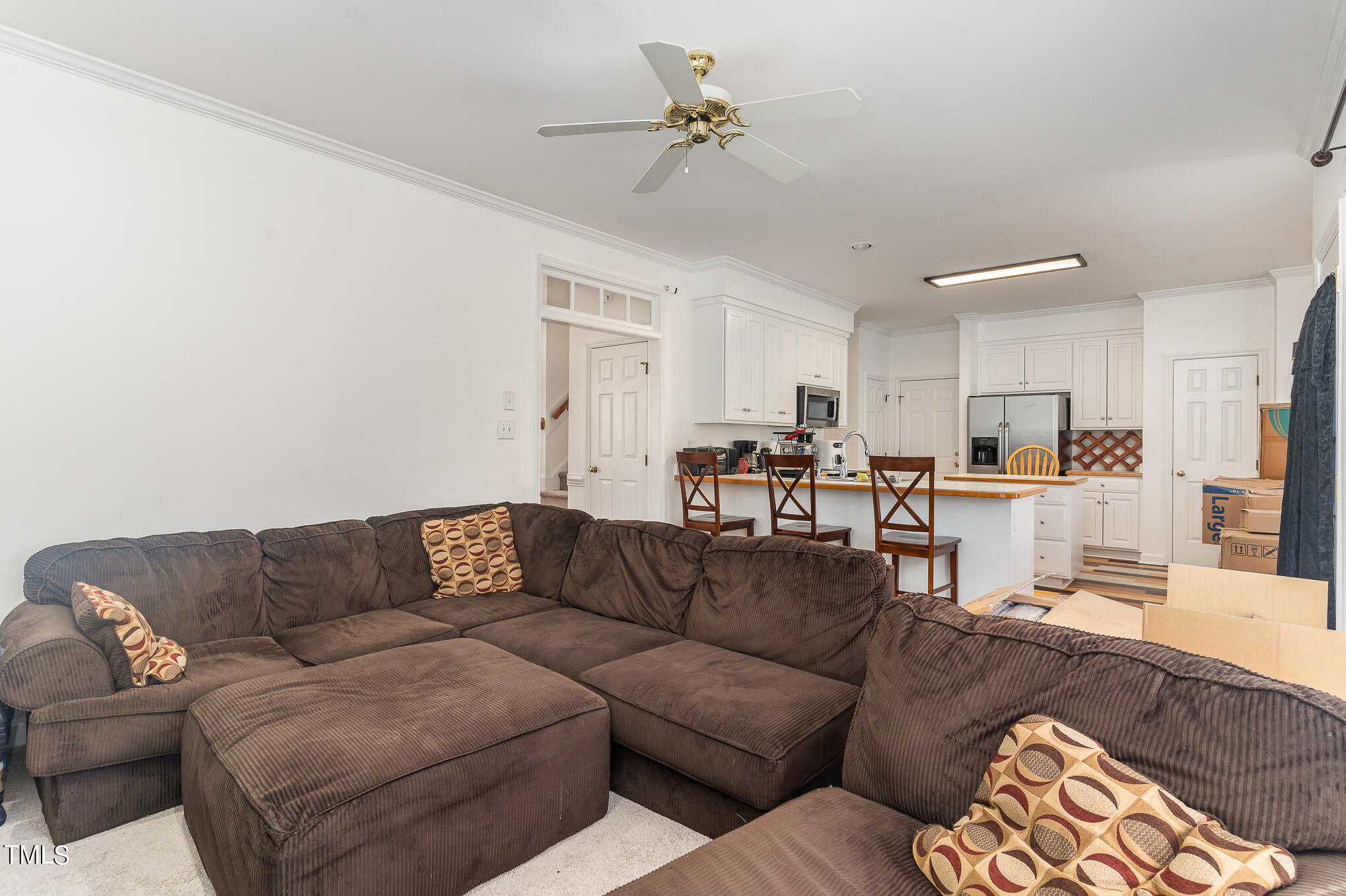 6020 Bur Trail Raleigh, NC 27616 - Photo 8 of 28 a living room with furniture and kitchen view