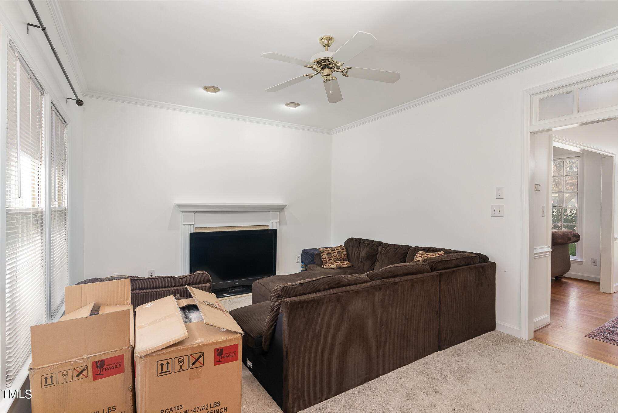 6020 Bur Trail Raleigh, NC 27616 - Photo 10 of 28 a living room with furniture and a fireplace