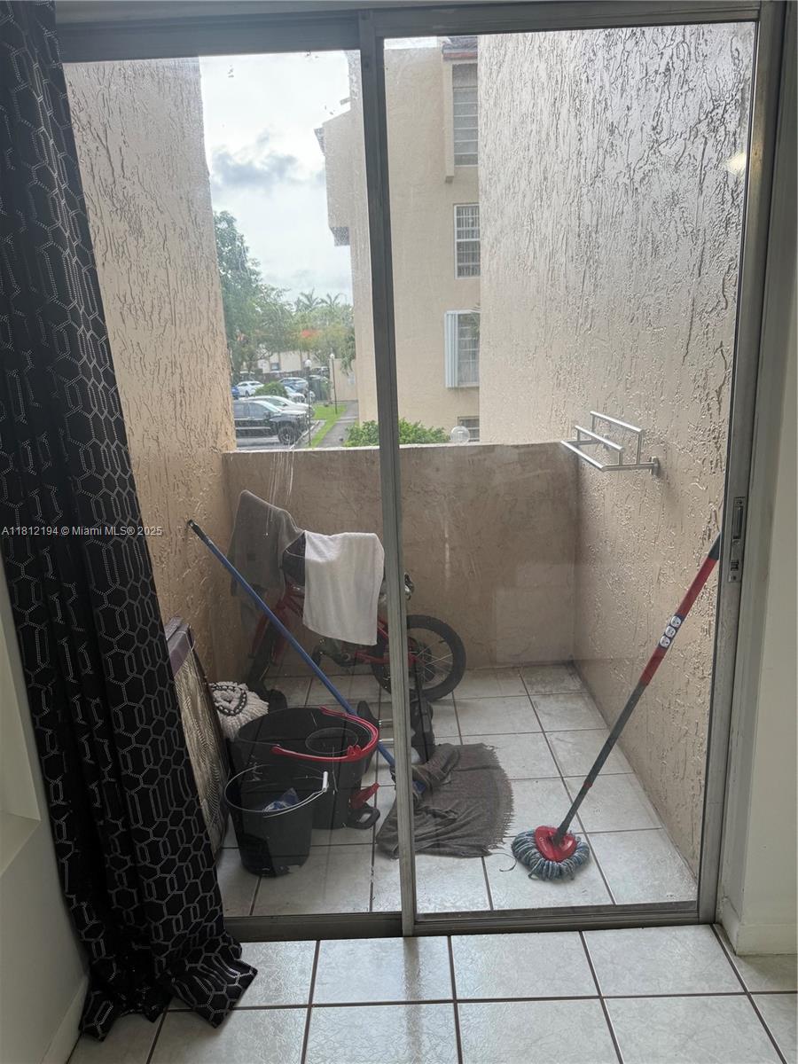 10661 Southwest 108th Avenue, Unit 2E Miami, FL 33176 - Photo 16 of 25 a bathroom with a sink and a shower