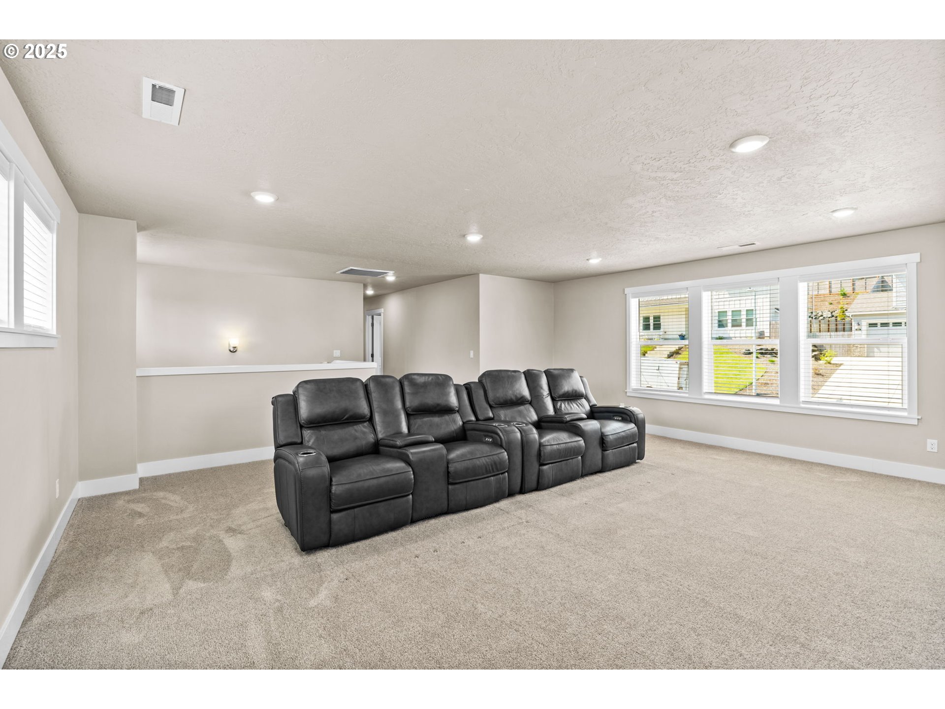 3740 Rockcress Road Eugene, OR 97403 - Photo 25 of 47 a living room with furniture and a large window