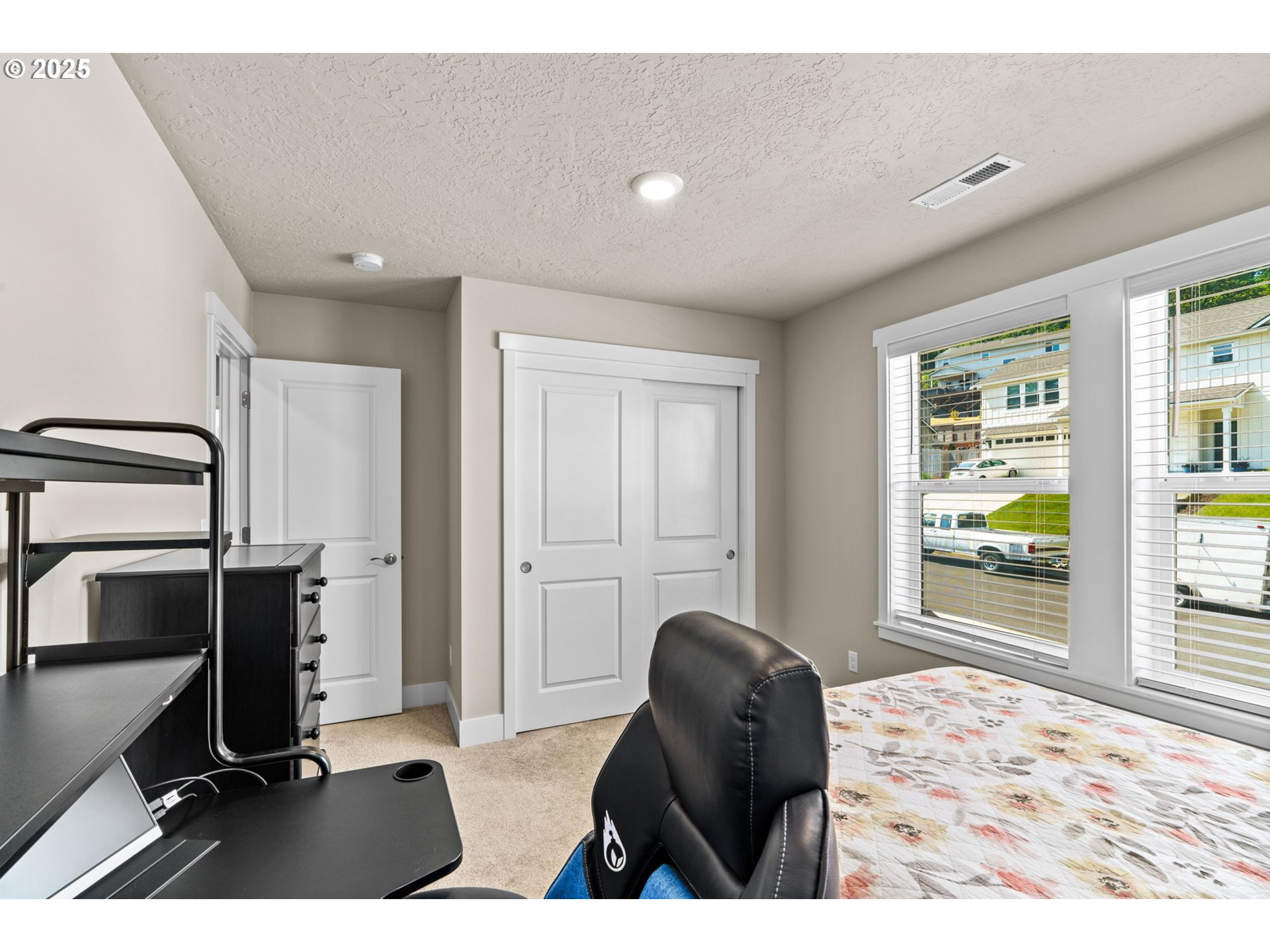 3740 Rockcress Road Eugene, OR 97403 - Photo 29 of 47 a living room with furniture window and gym equipment