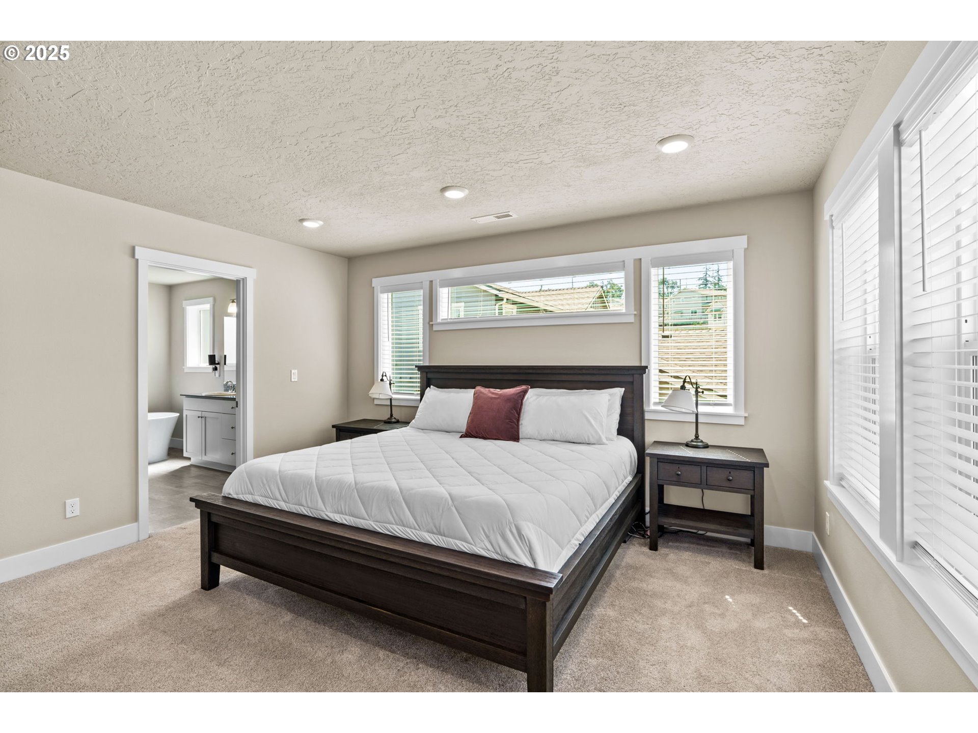 3740 Rockcress Road Eugene, OR 97403 - Photo 34 of 47 a bedroom with a bed and window