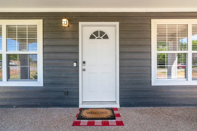 a front view of a house with a yard