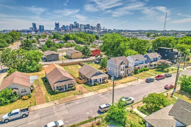 a view of a city with lawn chairs