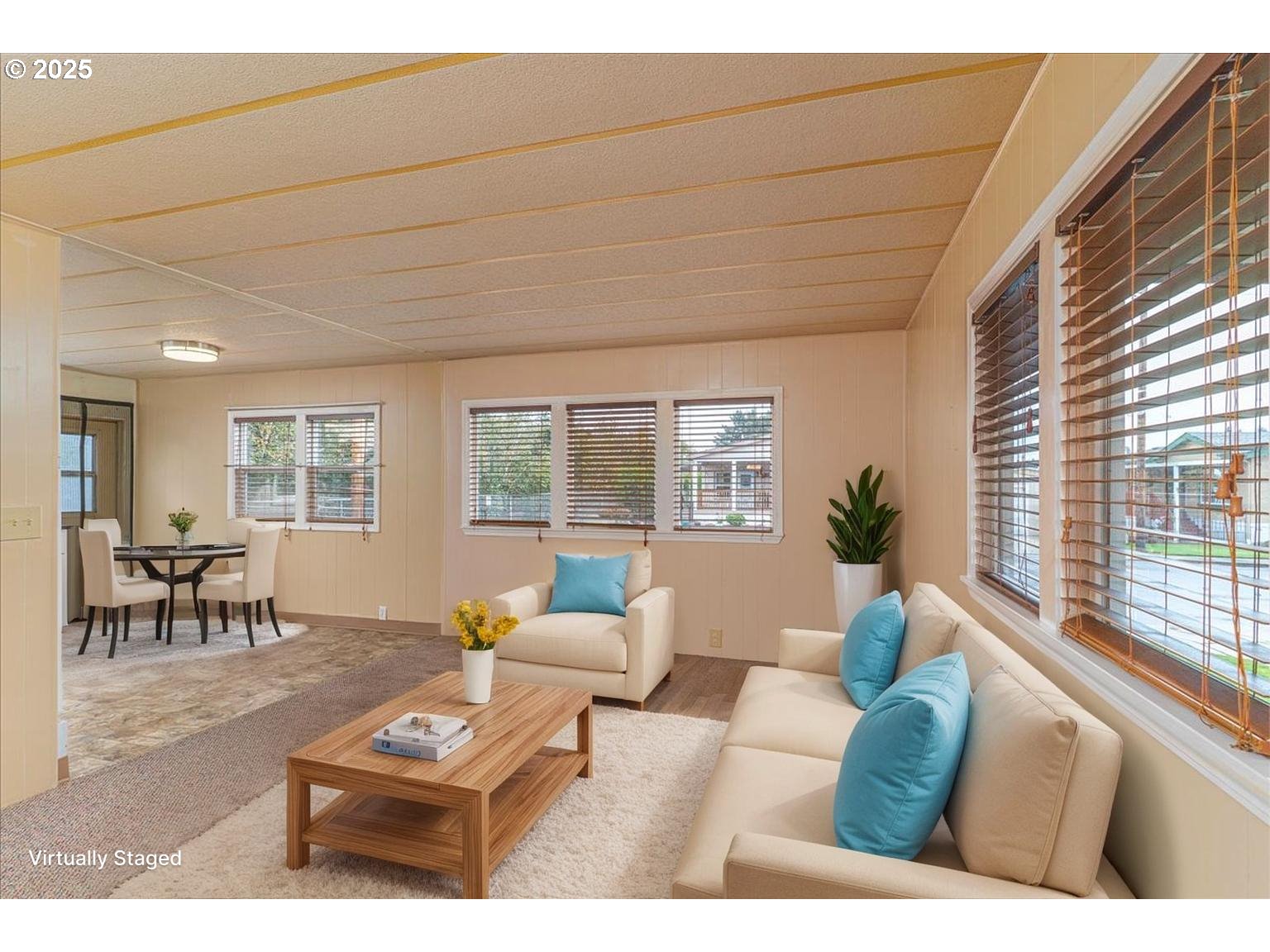 5510 Windsor Island Road North, Unit 19 Keizer, OR 97303 - Photo 8 of 32 a living room with furniture and a large window