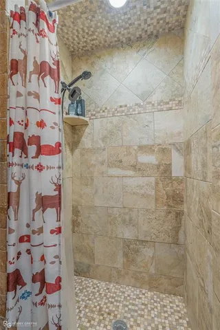 a view of room with furniture and windows