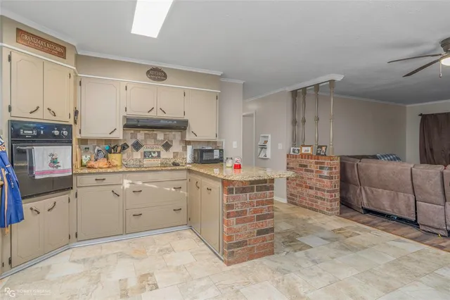 a kitchen with stainless steel appliances cabinets and a sink
