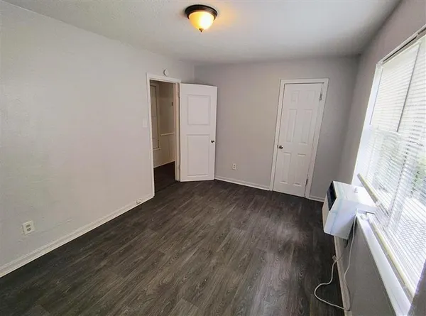 a view of livingroom with hardwood floor and window