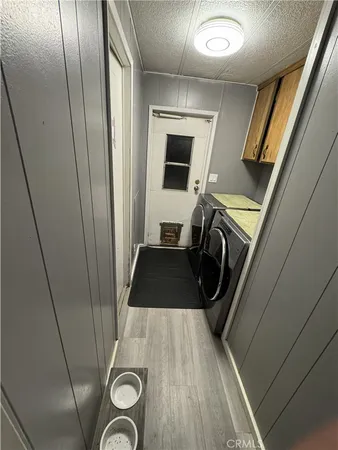 a bathroom with a sink a mirror and a shower