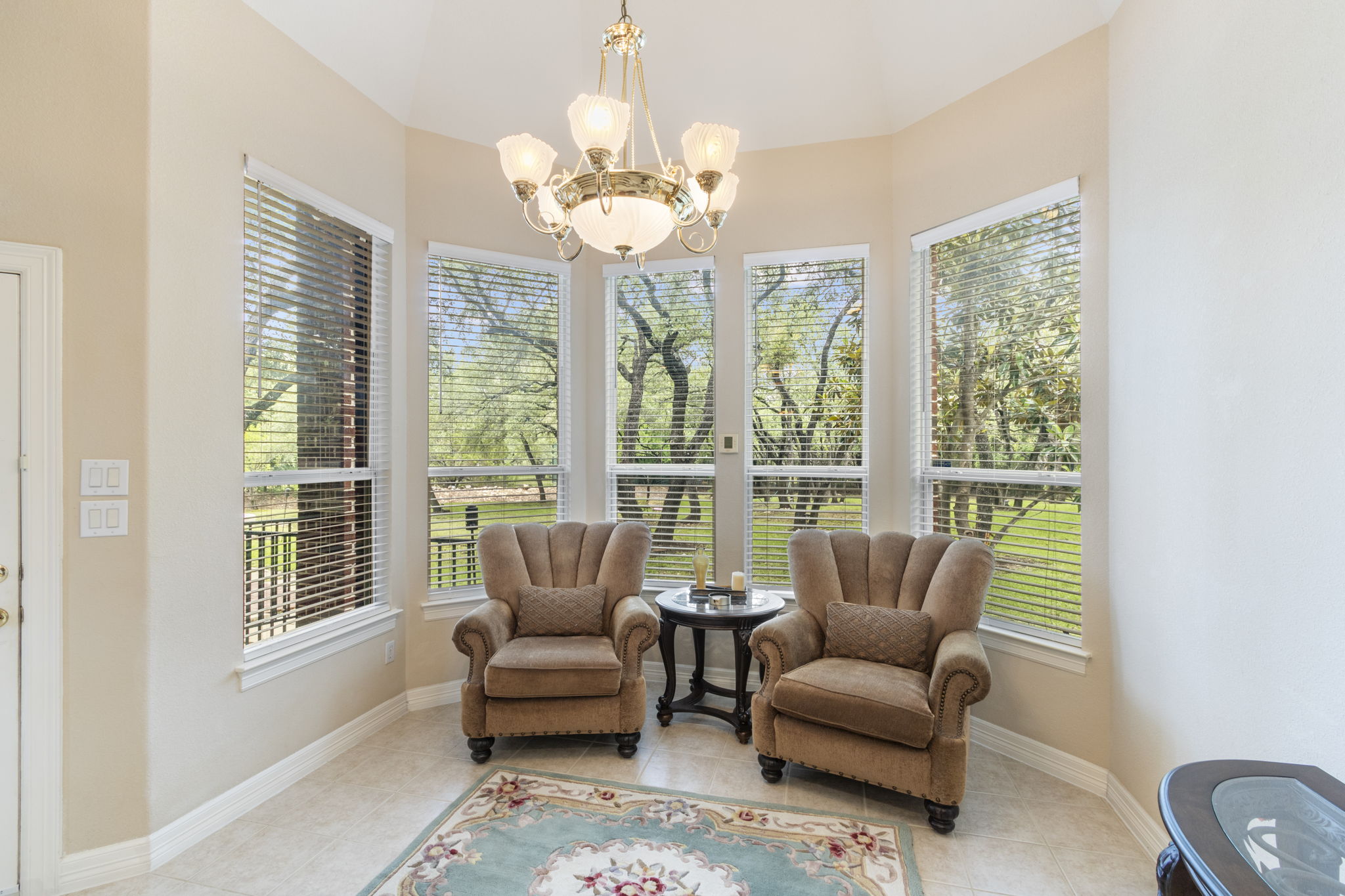 15 Sarazen Loop North Georgetown, TX 78628 - Photo 18 of 40 Dining area featuring a chandelier, light tile patterned floors, and baseboards
