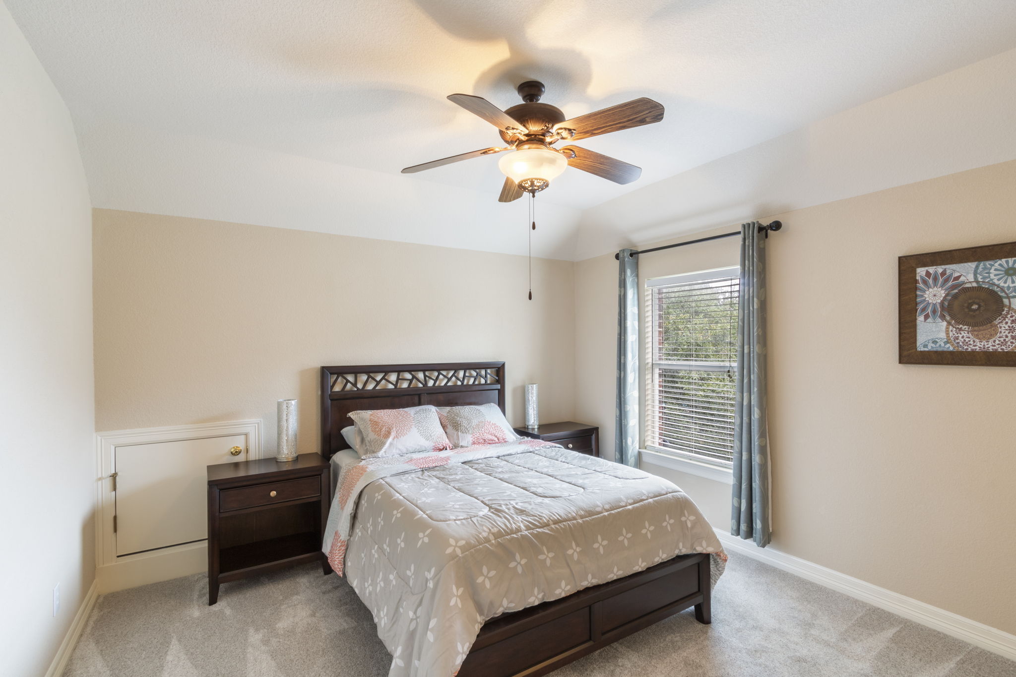 15 Sarazen Loop North Georgetown, TX 78628 - Photo 31 of 40 Bedroom with light carpet, baseboards, ceiling fan, and vaulted ceiling
