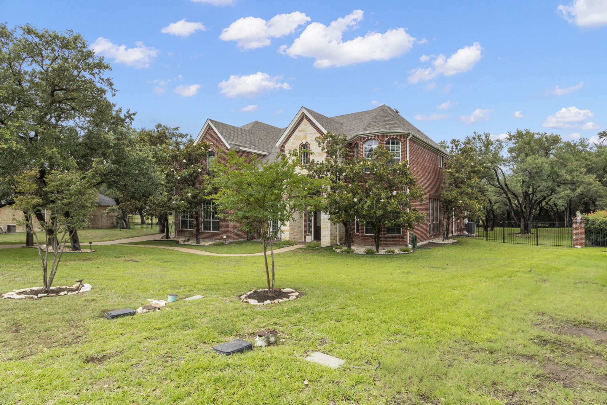 15 Sarazen Loop North Georgetown, TX 78628 - Photo 4 of 40 View of front of property featuring brick siding