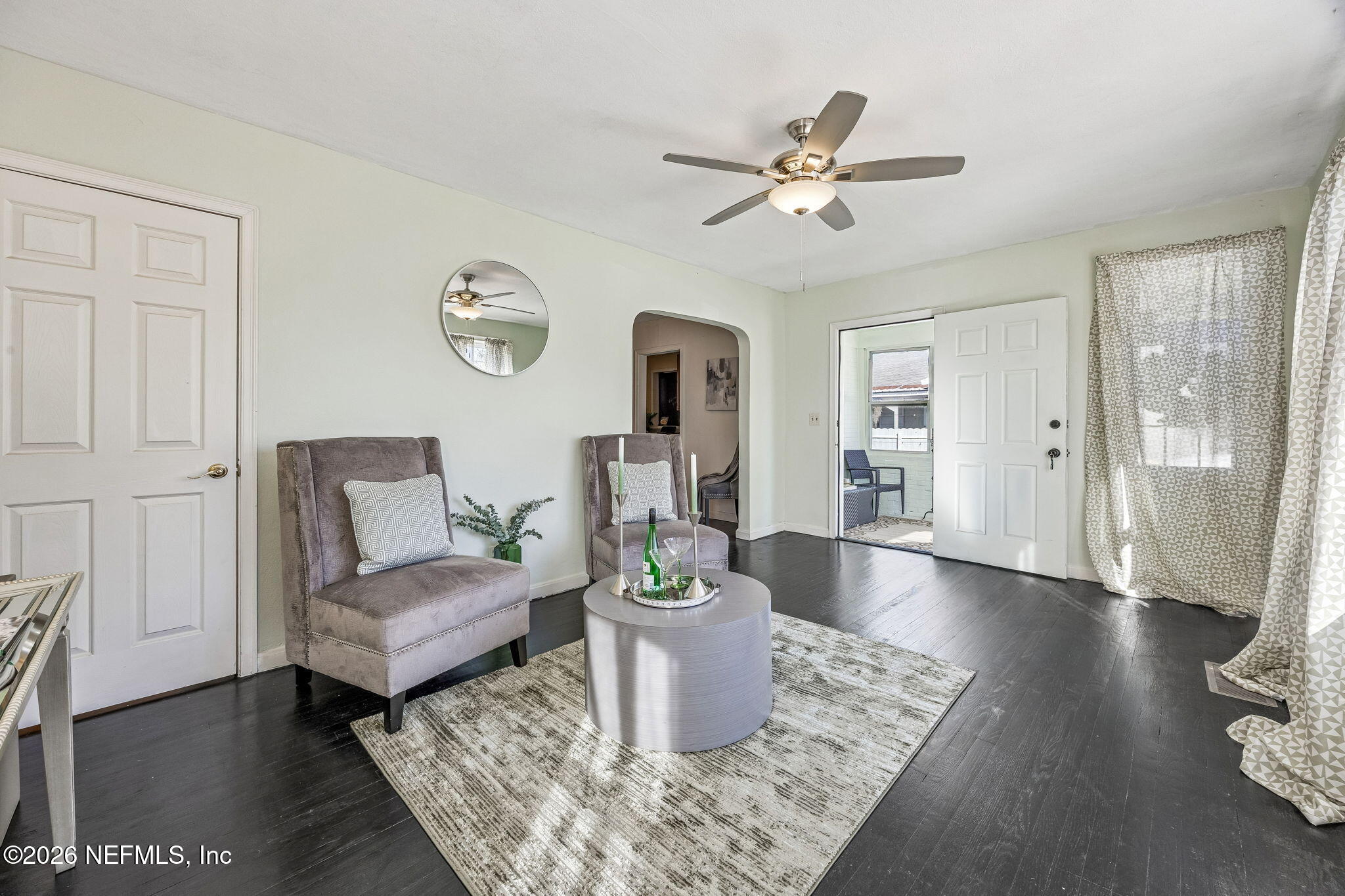 426 Aiken Road Jacksonville, FL 32216 - Photo 12 of 50 a living room with furniture and a wooden floor