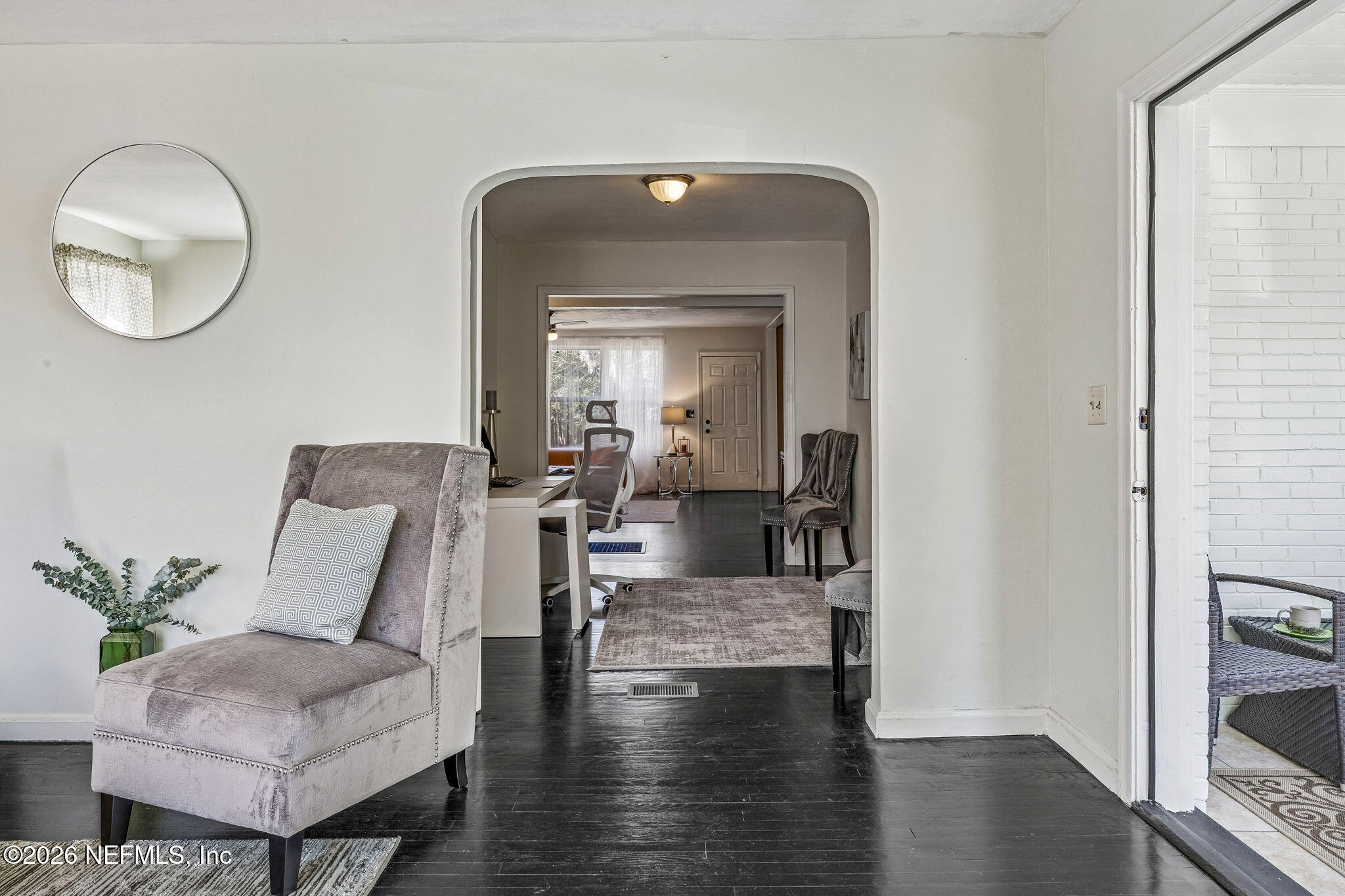 426 Aiken Road Jacksonville, FL 32216 - Photo 13 of 50 a living room with furniture and a mirror