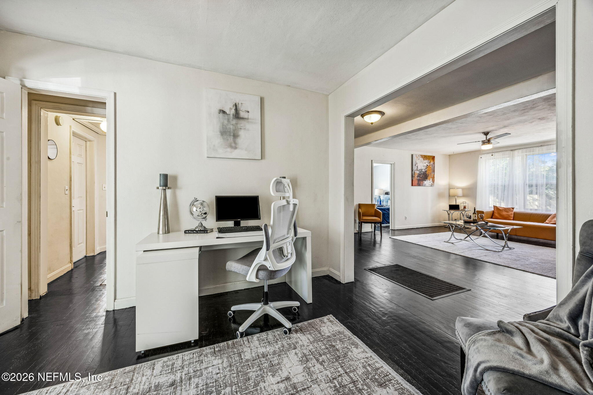 426 Aiken Road Jacksonville, FL 32216 - Photo 20 of 50 a living room with furniture and a wooden floor