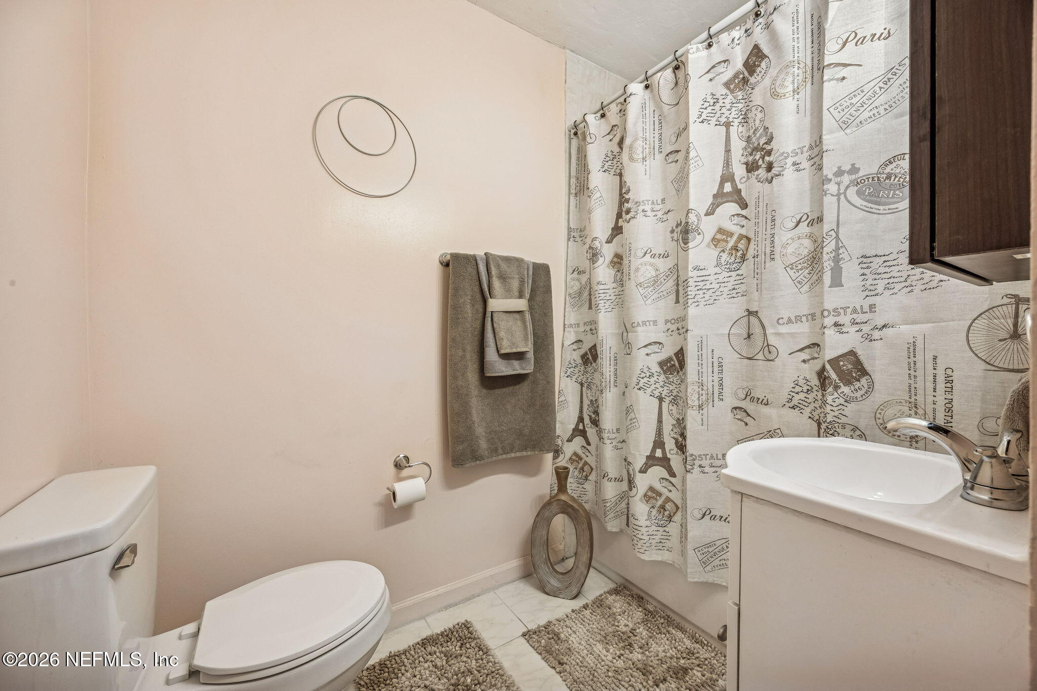 426 Aiken Road Jacksonville, FL 32216 - Photo 46 of 50 a bathroom with a granite countertop toilet sink and mirror