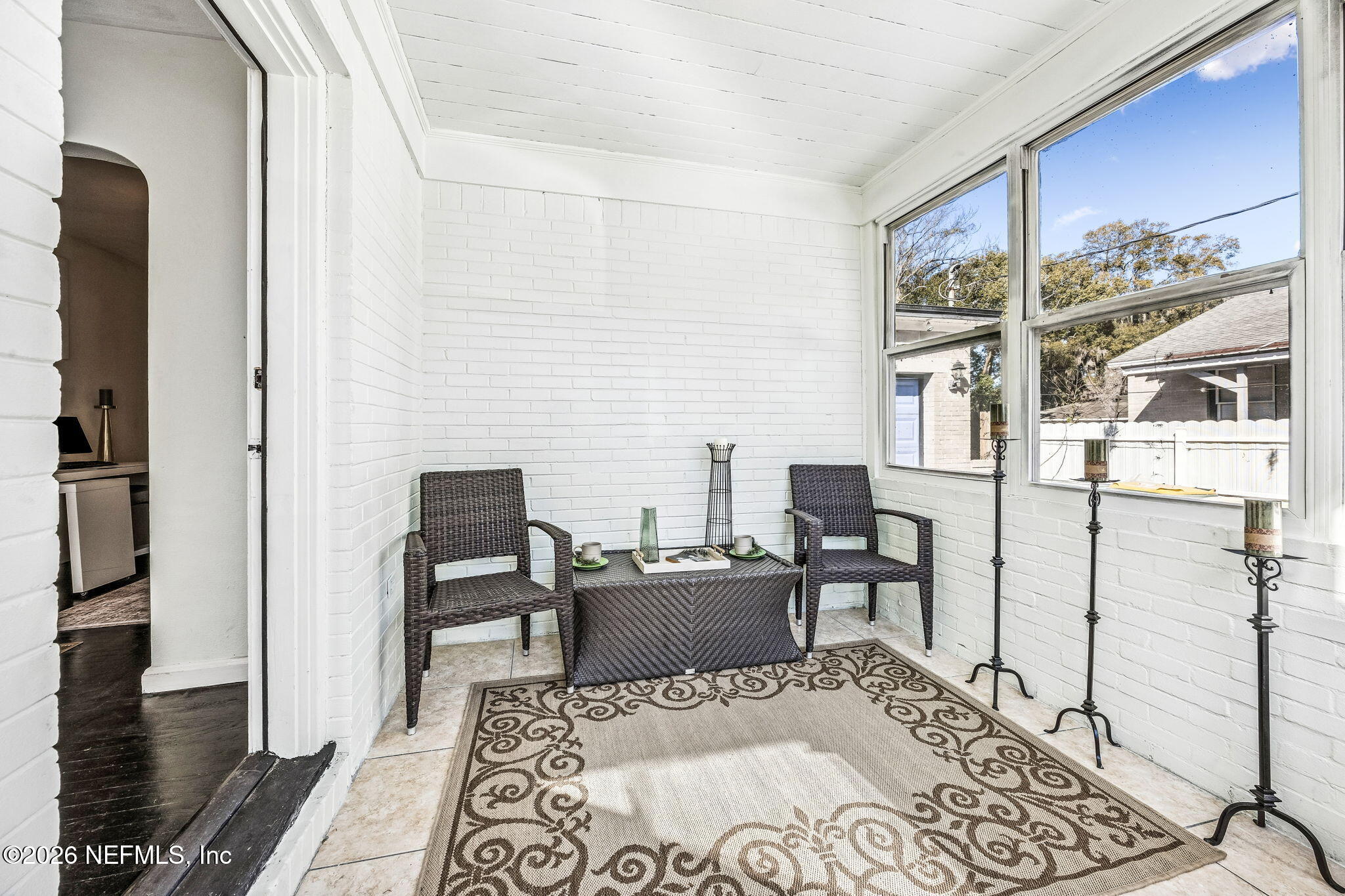 426 Aiken Road Jacksonville, FL 32216 - Photo 10 of 50 a living room with furniture a rug and a table