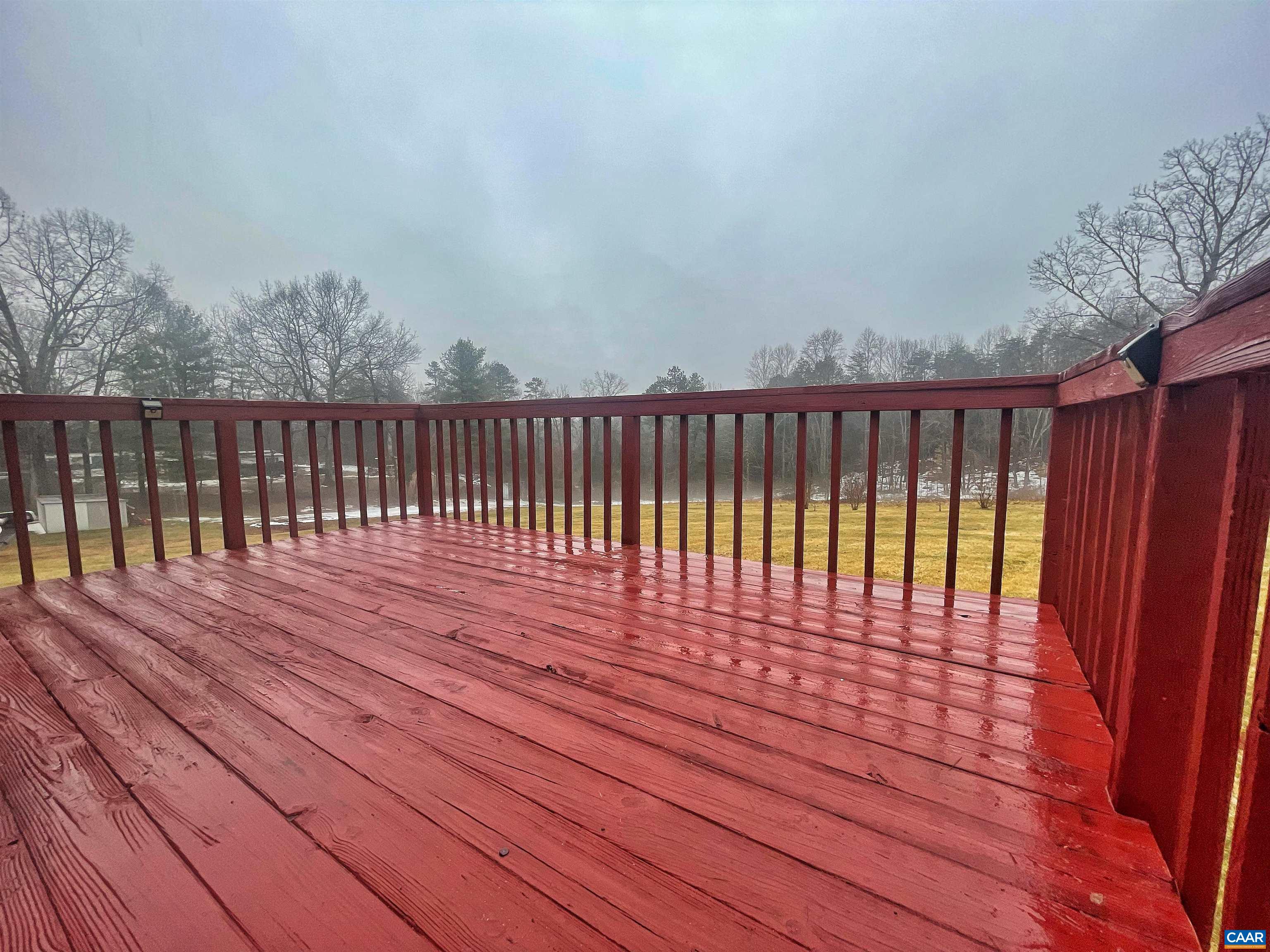 384 Carpenters Mill Road Ruckersville, VA 22968 - Photo 13 of 27 a balcony with wooden floor