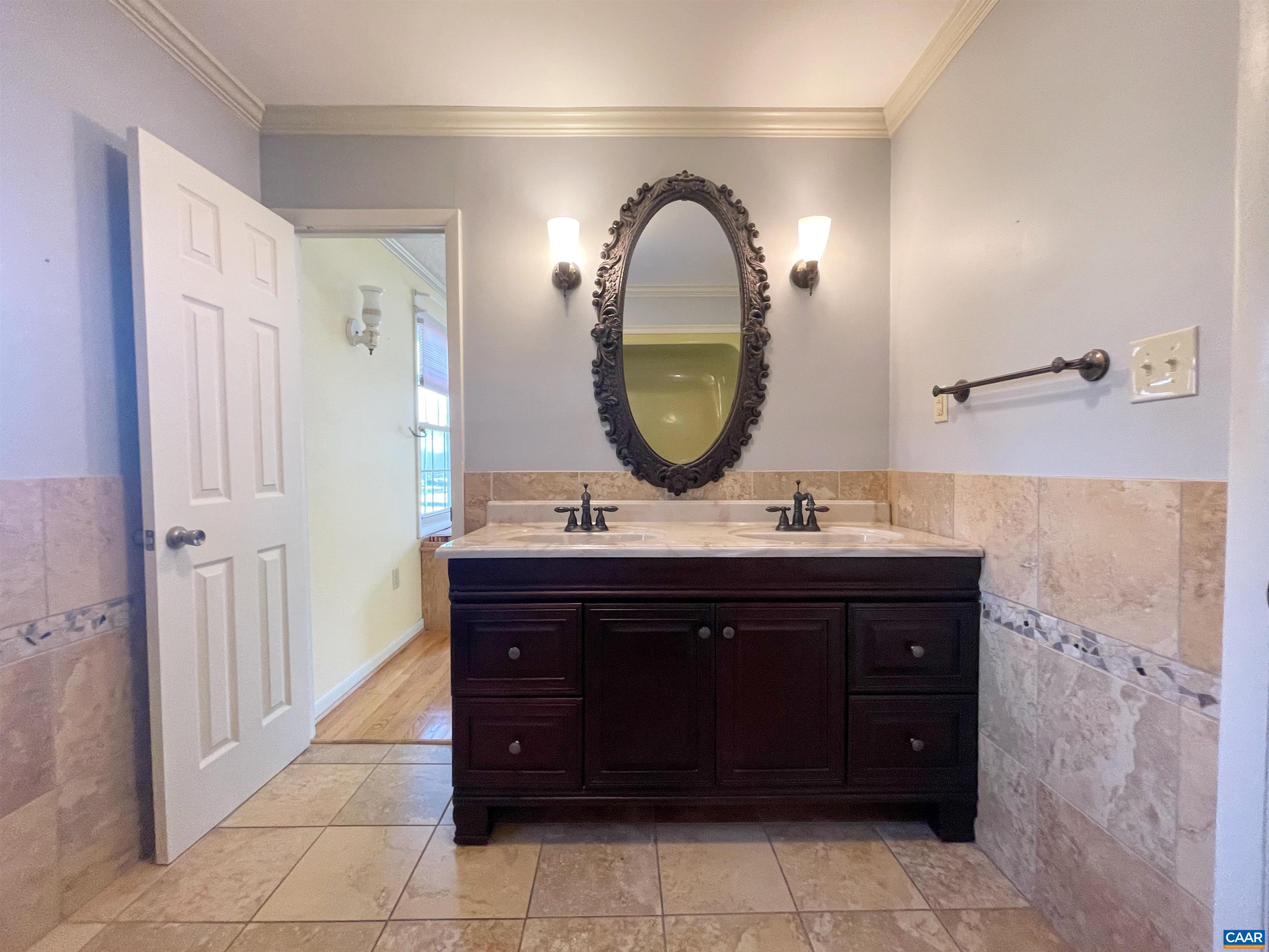 384 Carpenters Mill Road Ruckersville, VA 22968 - Photo 16 of 27 a bathroom with a sink and a mirror