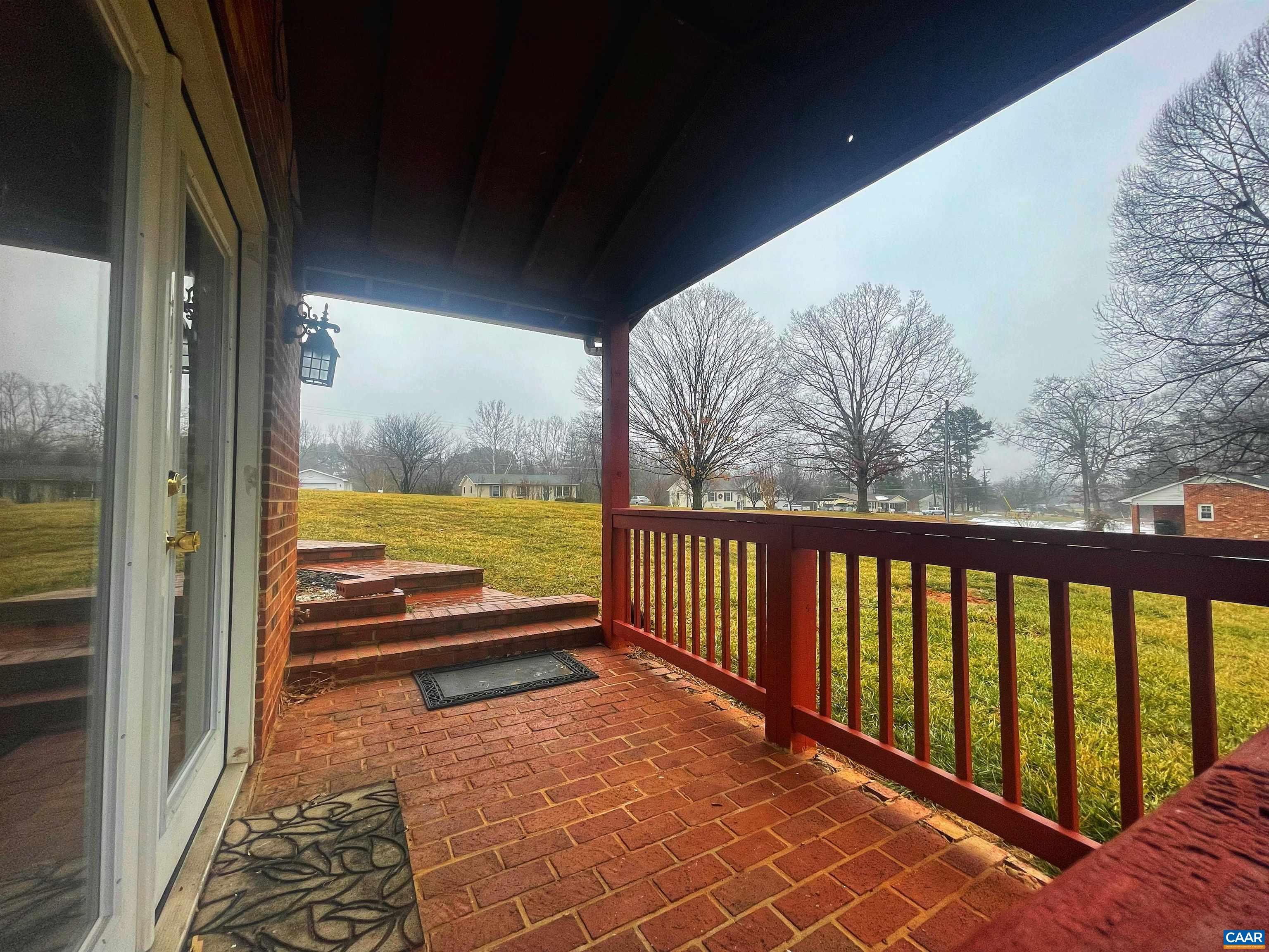 384 Carpenters Mill Road Ruckersville, VA 22968 - Photo 27 of 27 a view of a large room with wooden floor and fence