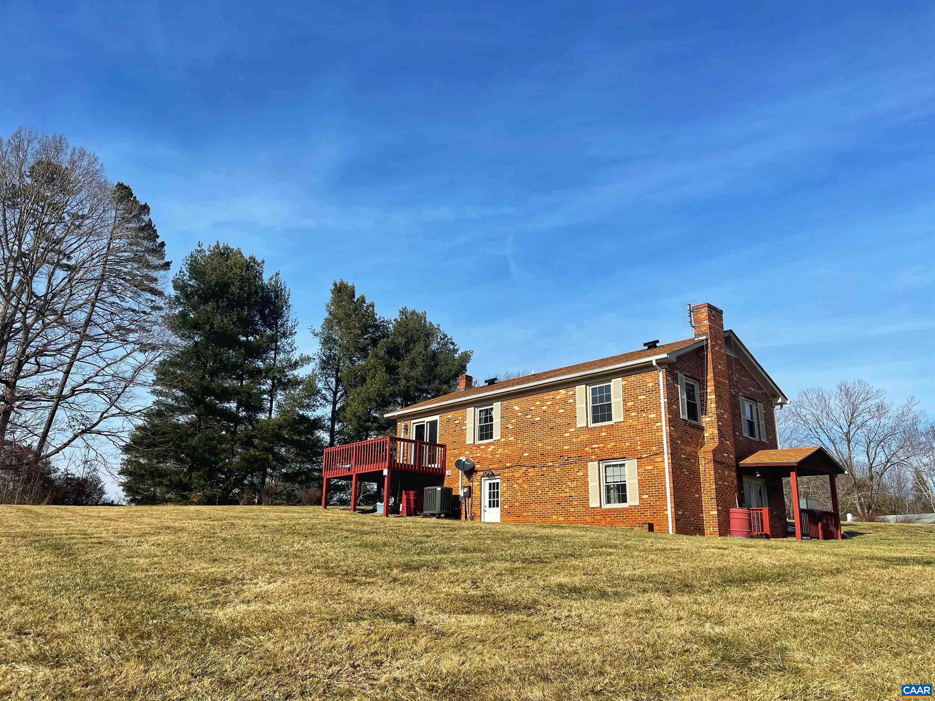 384 Carpenters Mill Road Ruckersville, VA 22968 - Photo 5 of 27 a view of a house with a big yard