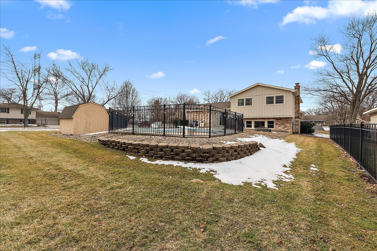 267 Center Road Frankfort, IL 60423 - Photo 22 of 26 a view of a house with snow on the road