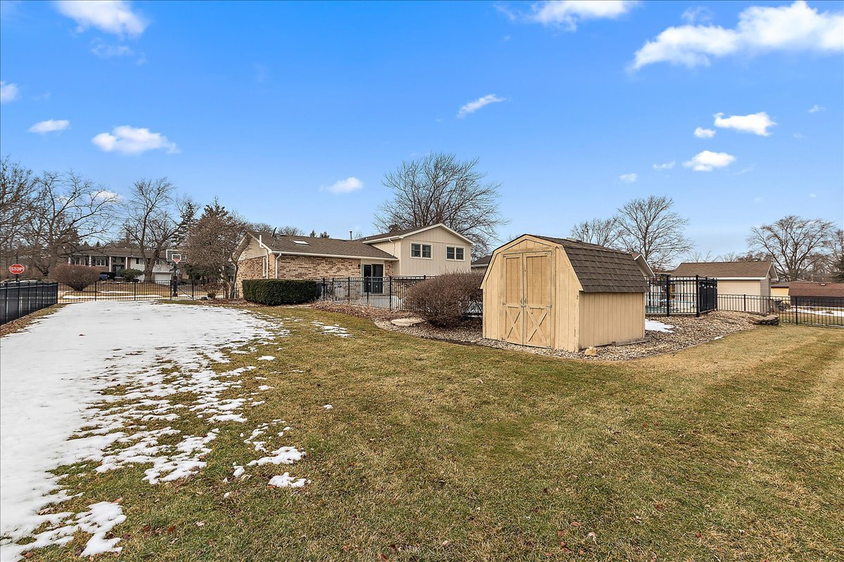 267 Center Road Frankfort, IL 60423 - Photo 23 of 26 a view of a white house with a yard