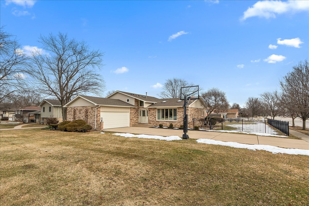 267 Center Road Frankfort, IL 60423 - Photo 24 of 26 a front view of a house with a yard