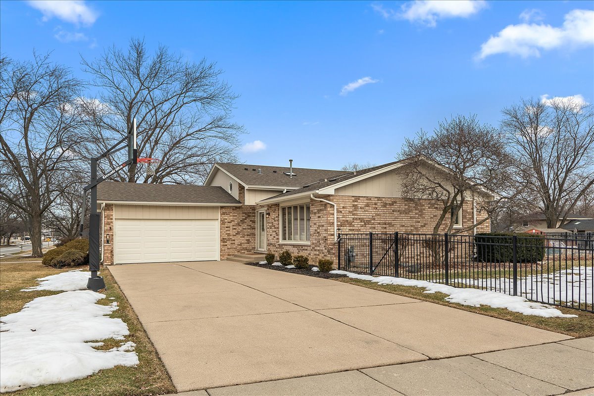 267 Center Road Frankfort, IL 60423 - Photo 25 of 26 a front view of a house with a yard and garage