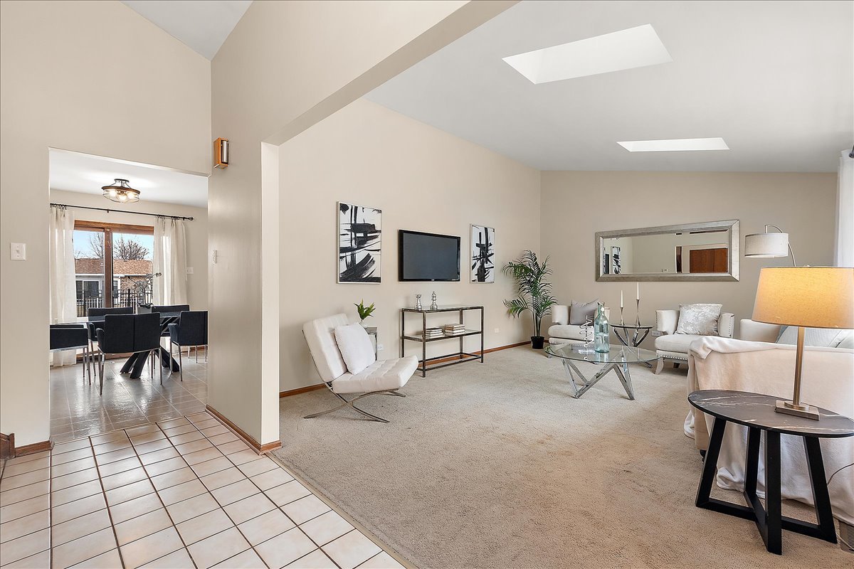 267 Center Road Frankfort, IL 60423 - Photo 3 of 26 a living room with furniture and a flat screen tv