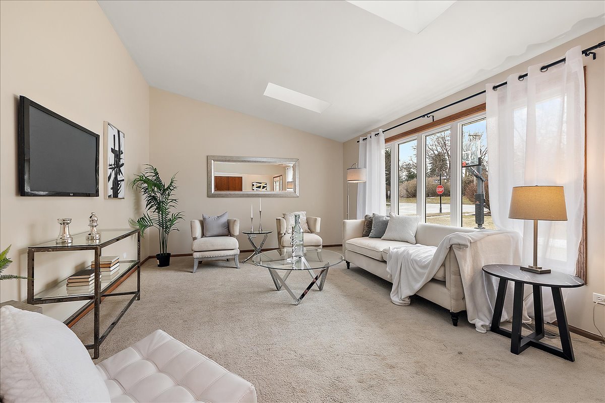 267 Center Road Frankfort, IL 60423 - Photo 4 of 26 a living room with furniture and a flat screen tv