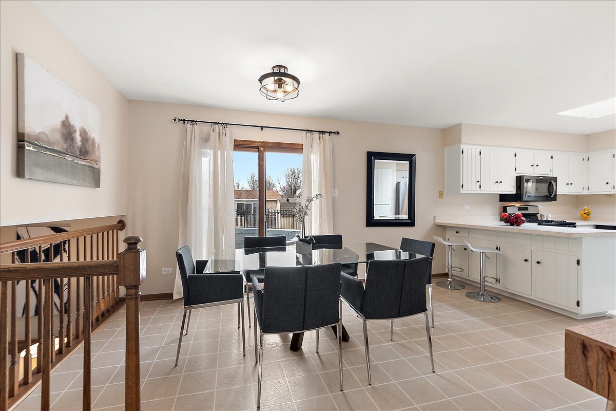 267 Center Road Frankfort, IL 60423 - Photo 6 of 26 a view of a dining room with furniture