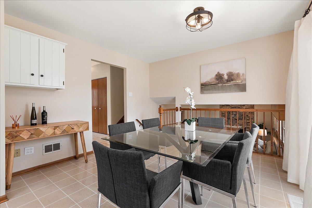 267 Center Road Frankfort, IL 60423 - Photo 9 of 26 a dining room with furniture and a window